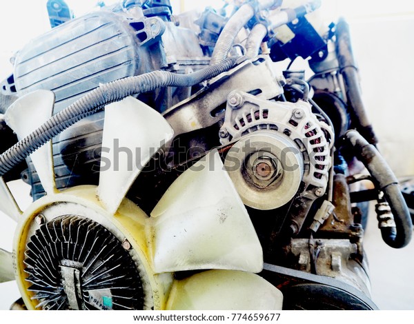 an old\
outdated diesel engine, a cylinder\
block