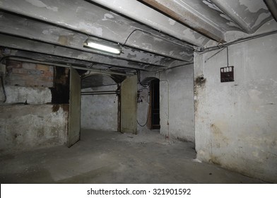 Old And Outdated Room In The Basement Of A House With Electric Installation