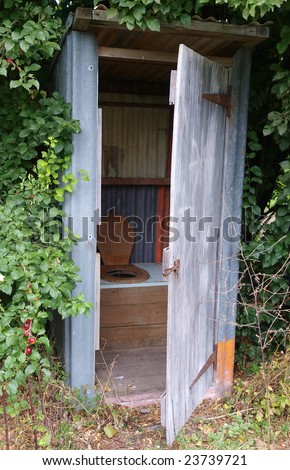 Old Outhouse with the Door Open