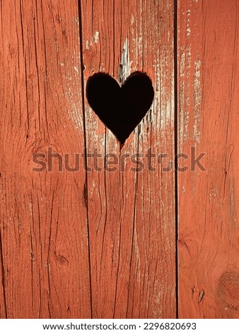 Old outside toilet, outhouse, red with carved heart ストックフォト © 