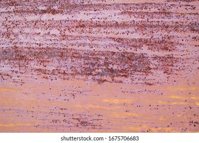 Old Paint On The Surface. Horizontal Streaks Of Stripes, Severe Corrosion, Rust. Primary Colors - Corvette, Oriental Pink, Fog, Persian Plum.