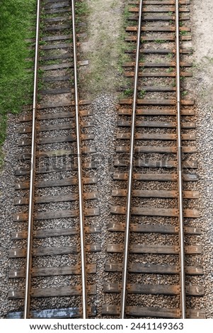 An old pair of iron paralel railway from above
