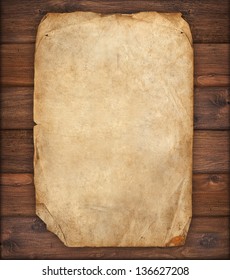 old paper on brown wood texture - Shutterstock ID 136627208