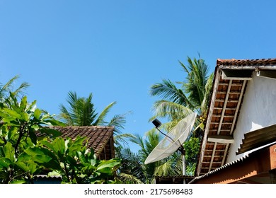 Old Parabolic Antenna On The Roof.