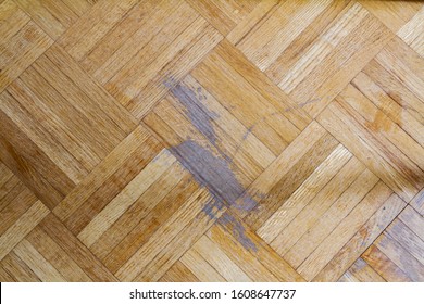 Old Parquet Floor With Scratch Marks; Indoor Hardwood Flooring Needing Refinishing