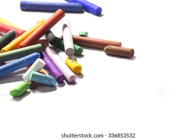 Old Pastel Colorfuls Crayons On White Background