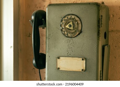 Old Pay Phone On The Wall