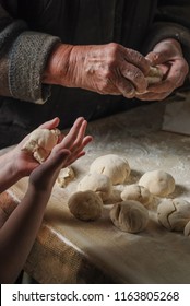 Old People And Children's Hands Cooking Pies. Homemade Family Bakery Concept. Close Up