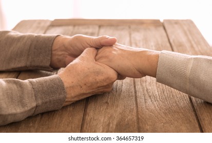 Old people holding hands. couple concept. love concept.