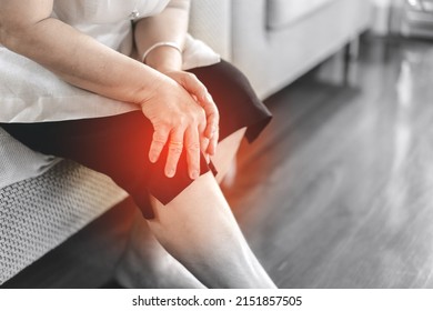 Old People Stay Alone At Home Has Injury Concept. Asian Elderly Woman Has Knee Osteoarthritis Pain.