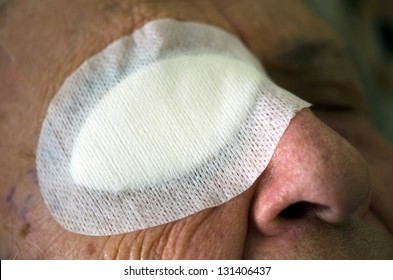 An Old Person With Eye Bandage