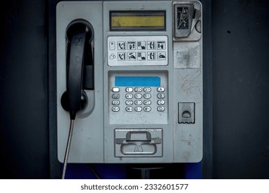 Old phone booth. An old landline telephone for the public. - Powered by Shutterstock