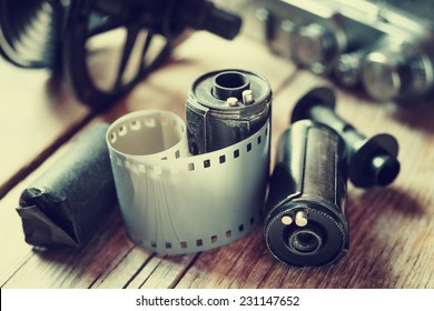 Old photo film rolls, cassette and retro camera. Vintage stylized. - Powered by Shutterstock