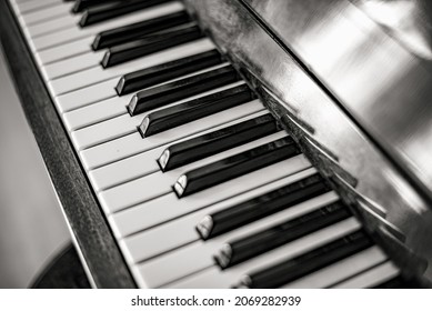 Old Piano And Keys Close Up. Toned Photo