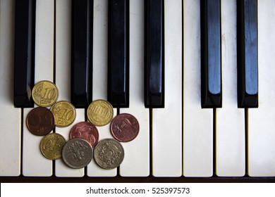 Old piano keys and coins