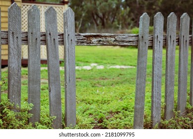 Old Picket Fence With Pickets Missing