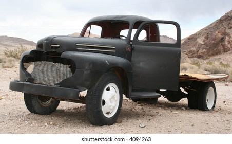 Old Pickup Truck In Desert