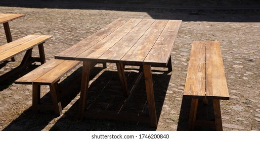 Old Picnic Bench In The Sunlight