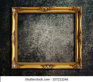 Old Picture Frame On Grunge Wall.