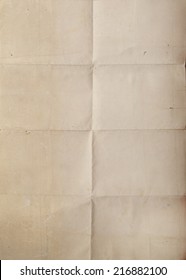 An Old Piece Of Paper With Crease Marks.