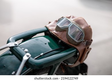 Old Pilot, Aviator Hat, Leather Motorcycle Helmet And Glasses