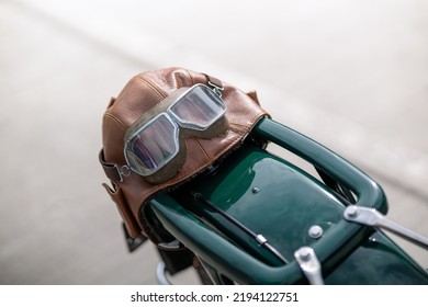 Old Pilot, Aviator Hat, Leather Motorcycle Helmet And Glasses