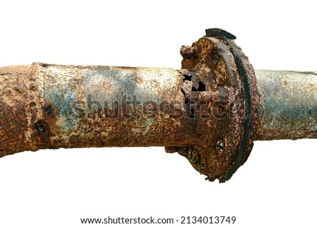 Old pipes after many years of operation, corroded metal pipe destroyed. Rusty steel tube with holes metal corrosion. on white background. Selective focus.                                  