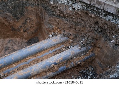 Old Pipes For Sewerage, Water Supply, Concept Of Repairing Urban Communications, Conducting Electrical Networks, Underground Laying Optical Fiber For Communication, Water Supply Failure