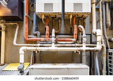 Old Pipes. Water And Gas Supply At Home. Pipes Of Cold And Hot Water Supply. Water And Gas Supply System. Delivery Of Energy Resources To Homes.