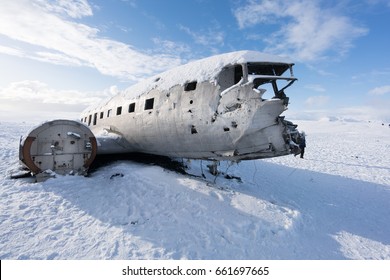 Old plane wreck on snow covered landscape by day, Iceland, Europe. Iceland nature 2017 winter cold