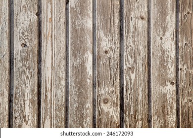 Old Planks Of Garden Shed With Peeling White Paint