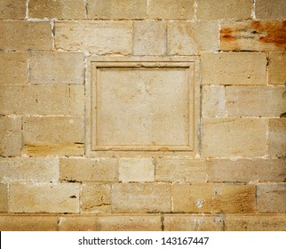 Old Plaque On Stone Wall