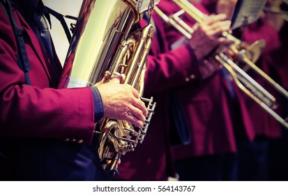 Old Player Of Saxophone In The Brass Band