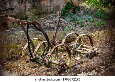 Old Plough In Abandoned Yard