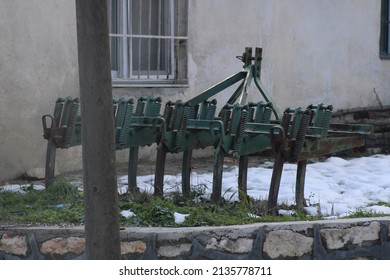 An Old Plow In The Yard