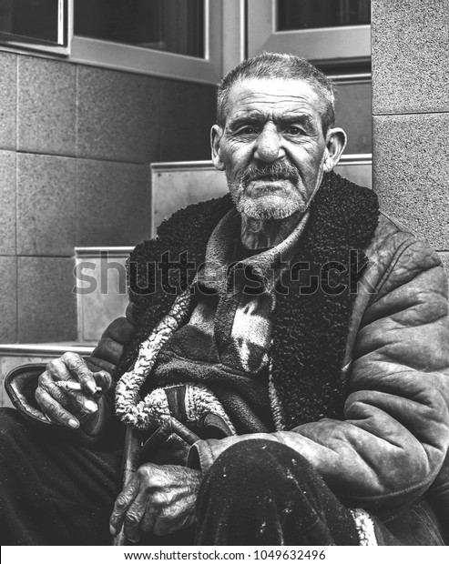 Old Poor Homeless Gypsy Man Sitting Stock Photo (Edit Now) 1049632496