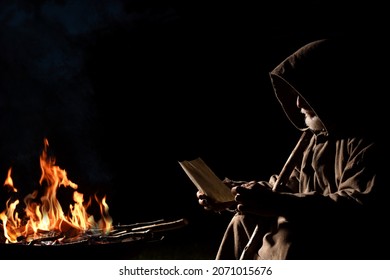 Old Poor Medieval Man With Message By The Fire 