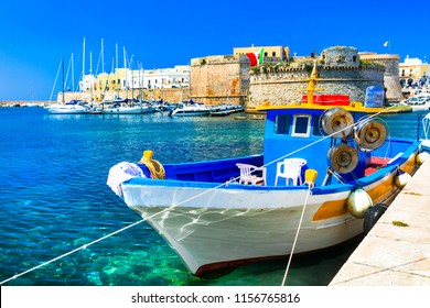 Old port of Gallipoli, view with castle amd boats, Puglia , Italy