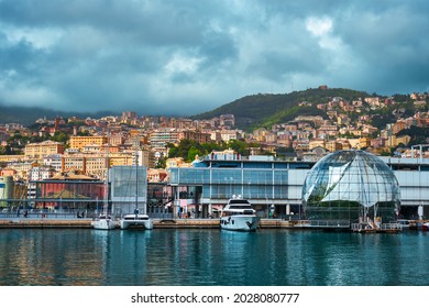 Old Port Porto Antico Of Genoa (Genova) With Yachts And Boats With Aquarium Biosphere Building Under Stormy Sky. Genoa, Italy