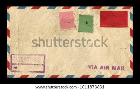 old postage envelope on a black background, message, air mail
