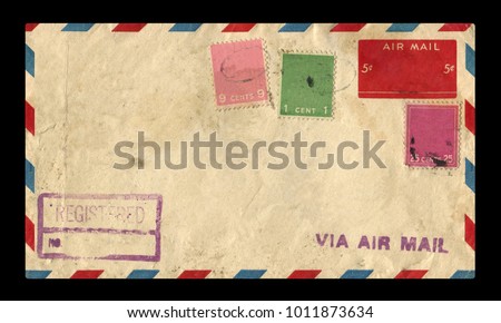 old postage envelope on a black background, message, air mail
