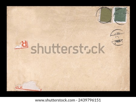 Old postage envelope on a black background, message, air mail