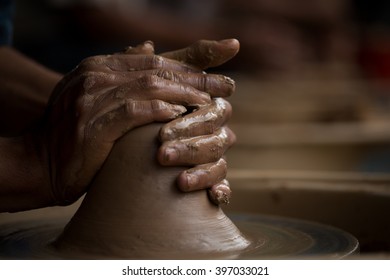 Old Potter Creating A New Ceramic Pot