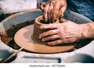 Old Potter Creating A New Ceramic Pot