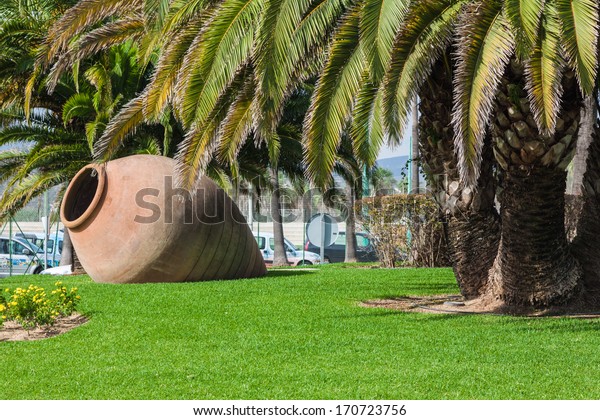 Old Pottery Crock Decoration On Ground Royalty Free Stock Image