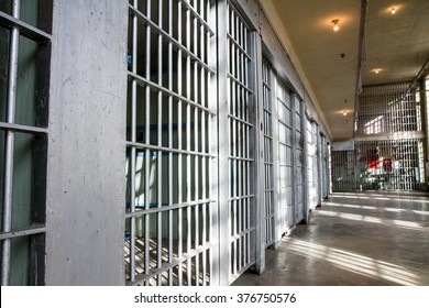 Old prison with it's bars locked up 