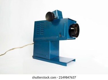 Old Projector (filmoscope) Of Blue Color On A White Background