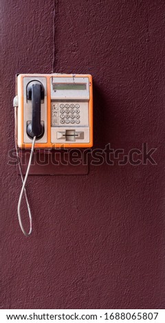 Similar – yellow retro telephone on pink wall, china