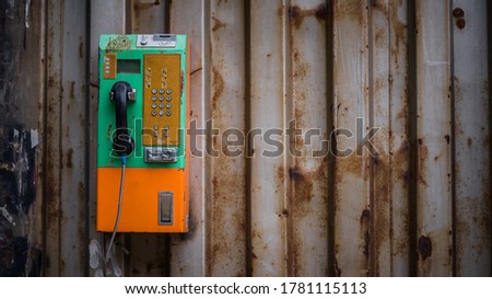 Similar – yellow retro telephone on pink wall, china