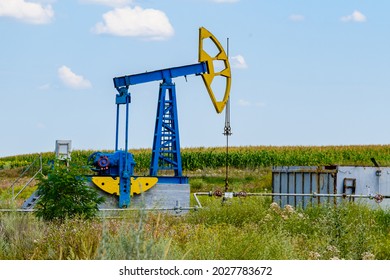 Old Pump Jack At Field. Petroleum And Gas Industry